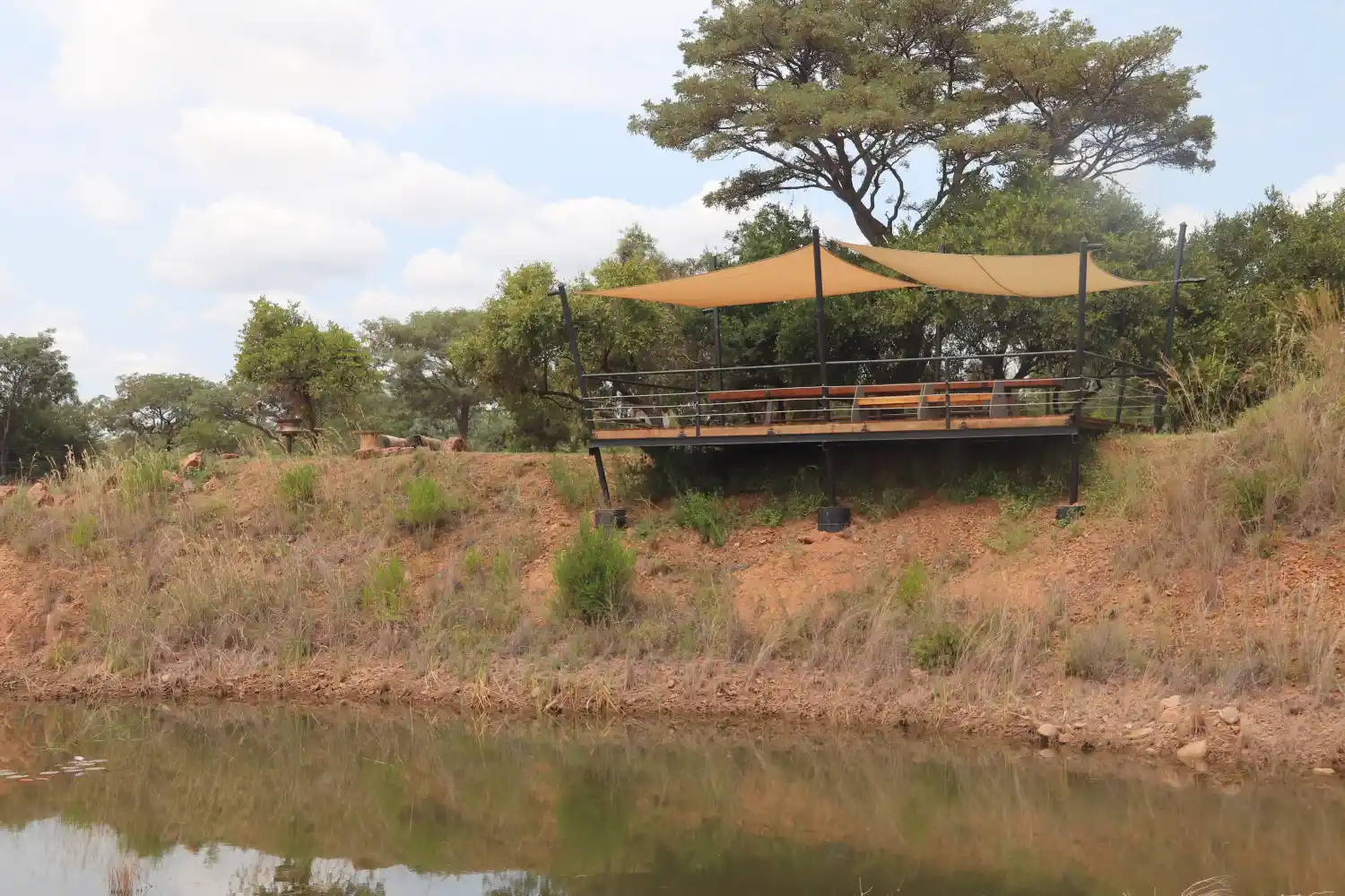 Front view of water hole picnic spot deck over-looking the dam.
