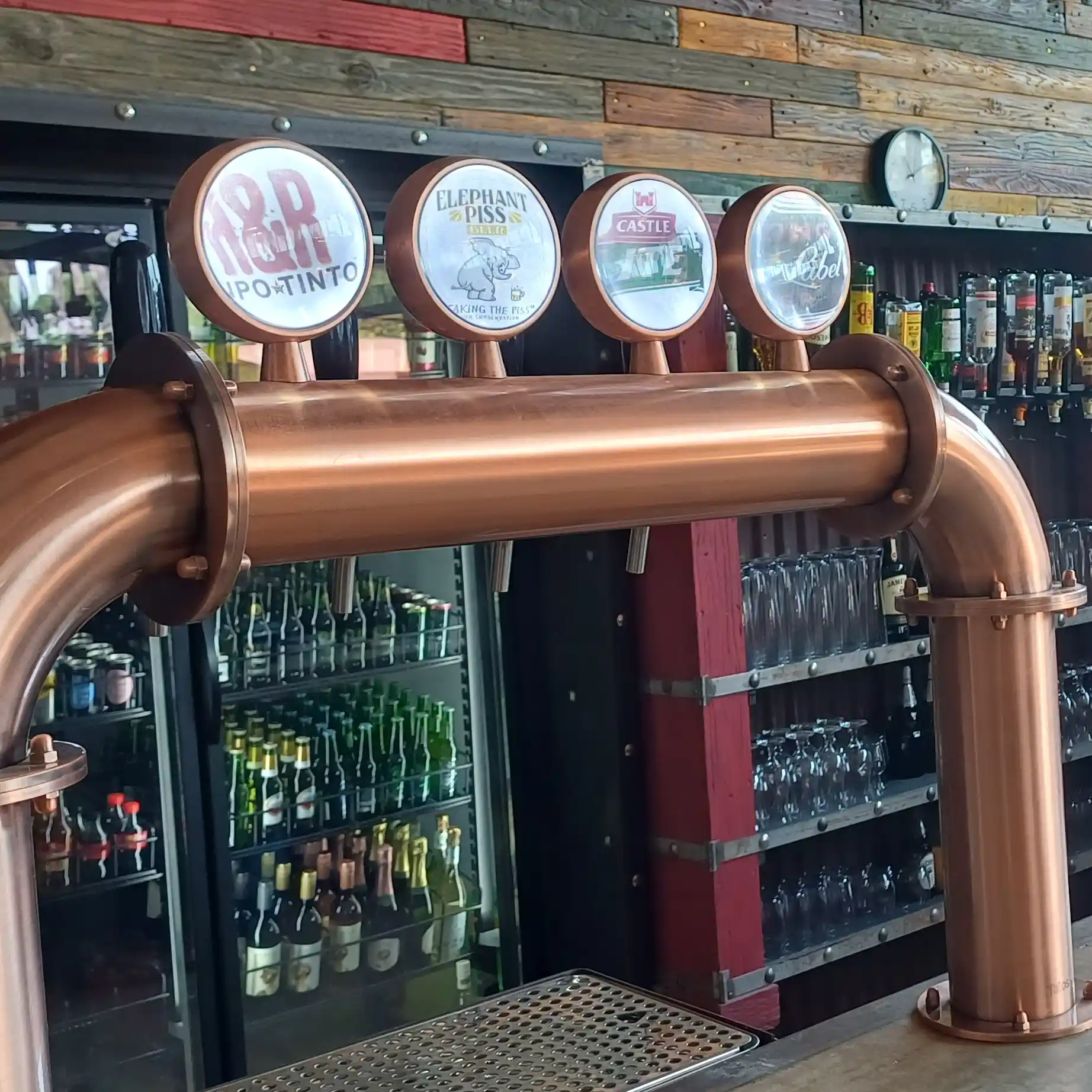 A selection of beers shows on the bar of the Rusty Rhino Pub.